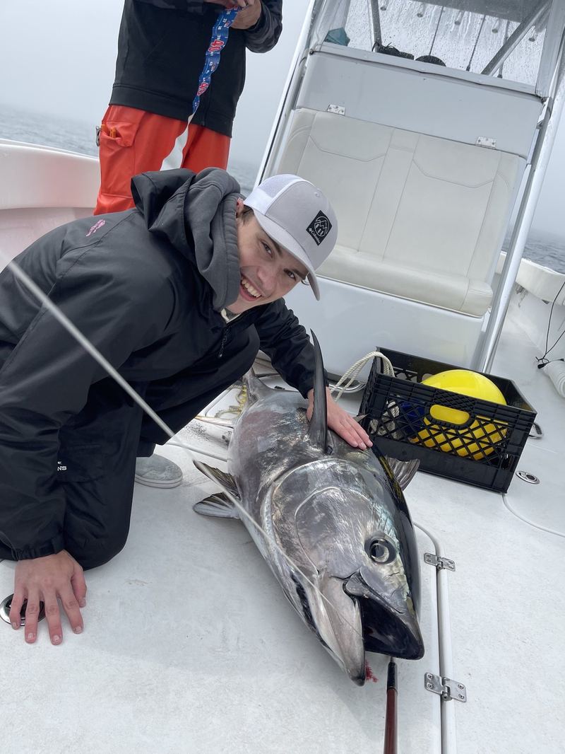 Angler with a bluefin tuna caught jigging offshore of Cape Cod