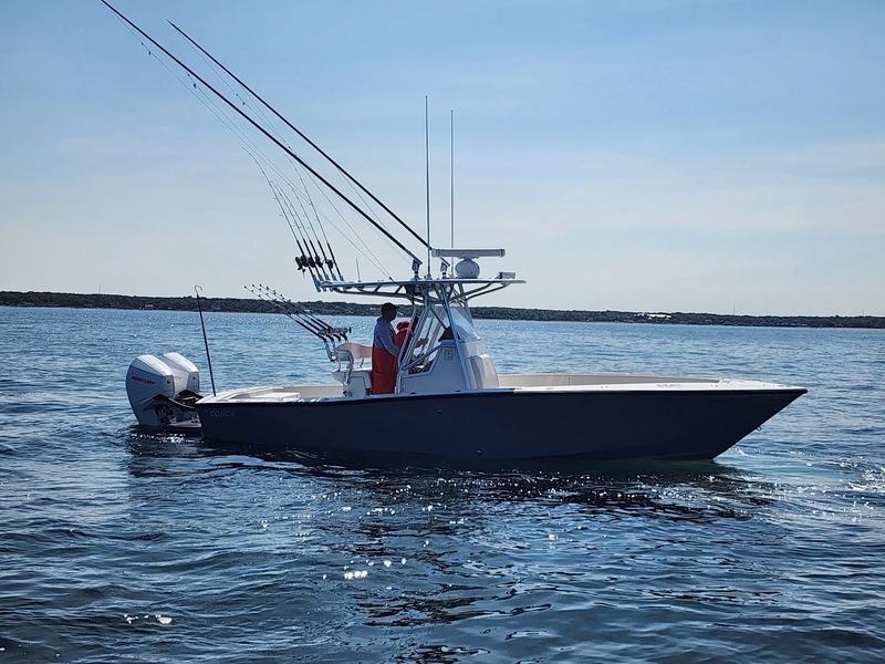 The grey 2021 Conch 27 Bon Temps rigged for fly and light-tackle fishing