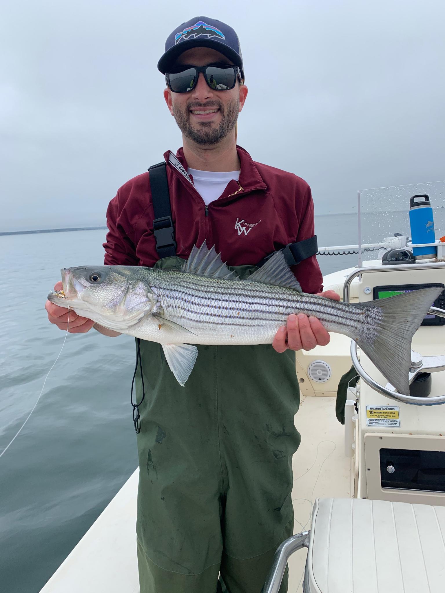 Nick’s first Striper on the fly Fly Fishing Boston Fly Fishing Charter Cape Cod and Boston